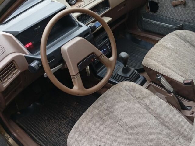 Бежевый Мицубиси Кольт, объемом двигателя 1.8 л и пробегом 100 тыс. км за 406 $, фото 2 на Automoto.ua