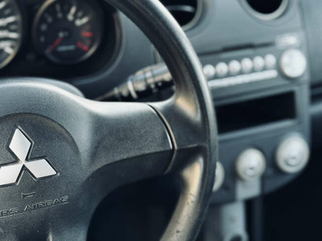 Міцубісі Кольт 2008 у Одесі на Automoto.ua Бежевий Міцубісі Кольт, об'ємом двигуна 1.33 л та пробігом 138 тис. км за 5000 $, фото 21 на Automoto.ua