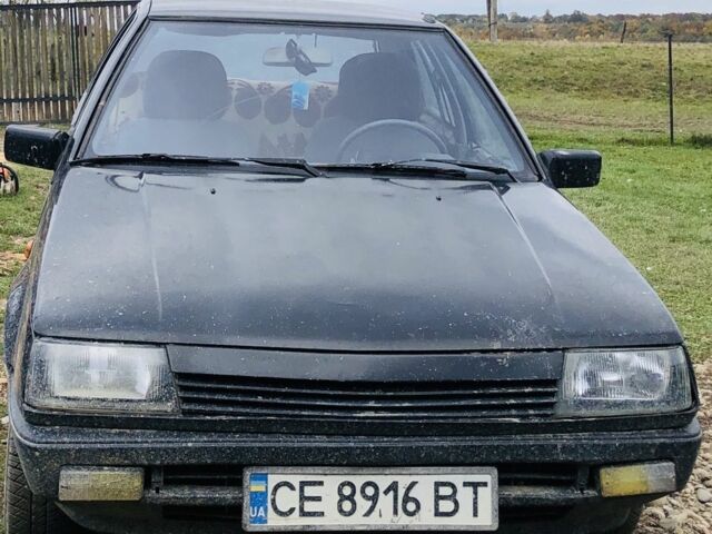 Черный Мицубиси Кольт, объемом двигателя 1.4 л и пробегом 100 тыс. км за 591 $, фото 1 на Automoto.ua