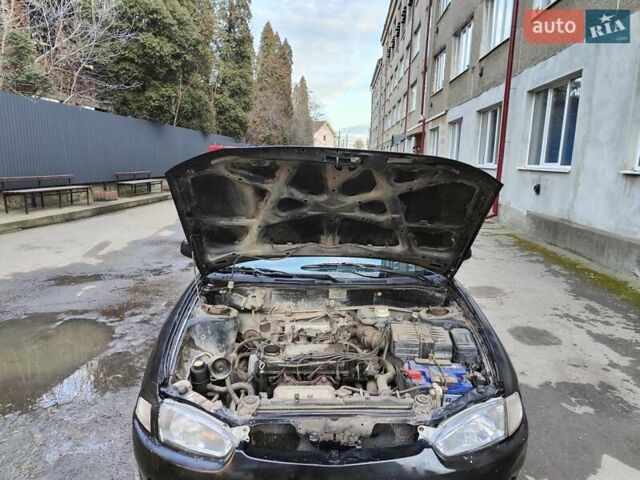 Чорний Міцубісі Кольт, об'ємом двигуна 1.3 л та пробігом 299 тис. км за 800 $, фото 2 на Automoto.ua