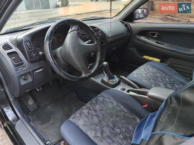 Чорний Міцубісі Кольт, об'ємом двигуна 1.3 л та пробігом 299 тис. км за 800 $, фото 10 на Automoto.ua