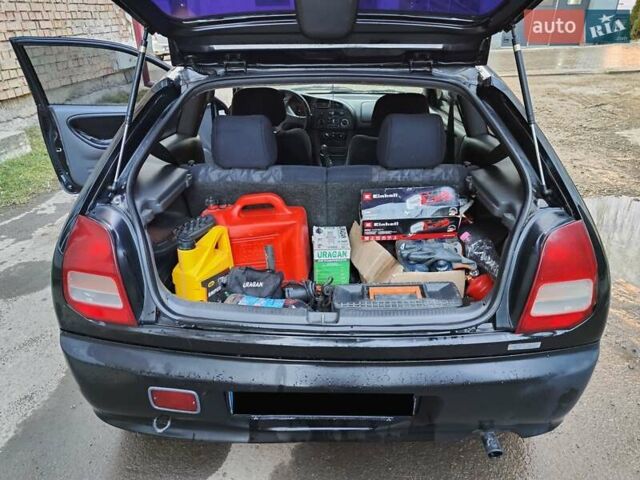 Чорний Міцубісі Кольт, об'ємом двигуна 1.3 л та пробігом 299 тис. км за 800 $, фото 18 на Automoto.ua