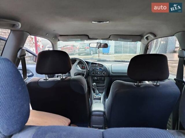 Чорний Міцубісі Кольт, об'ємом двигуна 1.3 л та пробігом 299 тис. км за 800 $, фото 7 на Automoto.ua