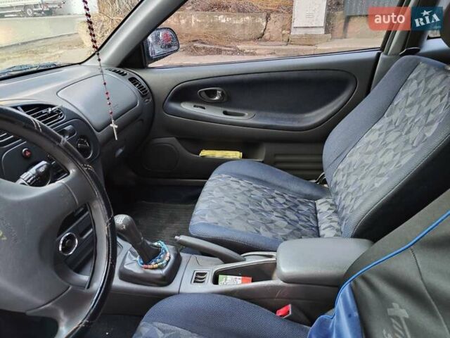 Чорний Міцубісі Кольт, об'ємом двигуна 1.3 л та пробігом 299 тис. км за 800 $, фото 9 на Automoto.ua