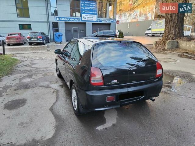 Чорний Міцубісі Кольт, об'ємом двигуна 1.3 л та пробігом 299 тис. км за 800 $, фото 20 на Automoto.ua