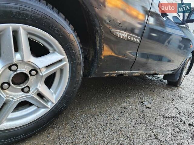 Чорний Міцубісі Кольт, об'ємом двигуна 1.3 л та пробігом 299 тис. км за 800 $, фото 6 на Automoto.ua