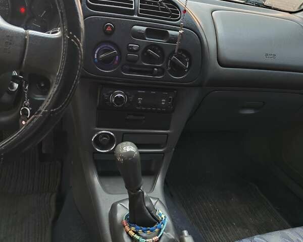 Чорний Міцубісі Кольт, об'ємом двигуна 1.3 л та пробігом 299 тис. км за 800 $, фото 8 на Automoto.ua