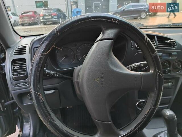 Чорний Міцубісі Кольт, об'ємом двигуна 1.3 л та пробігом 299 тис. км за 800 $, фото 11 на Automoto.ua