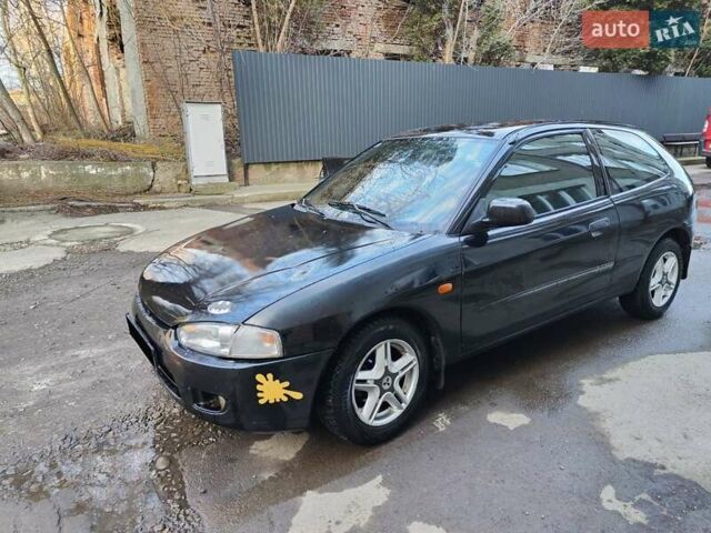 Чорний Міцубісі Кольт, об'ємом двигуна 1.3 л та пробігом 299 тис. км за 800 $, фото 22 на Automoto.ua