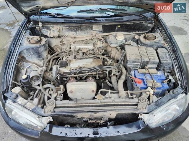 Чорний Міцубісі Кольт, об'ємом двигуна 1.3 л та пробігом 299 тис. км за 800 $, фото 4 на Automoto.ua