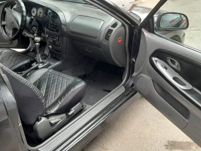 Чорний Міцубісі Кольт, об'ємом двигуна 1.3 л та пробігом 1000 тис. км за 3650 $, фото 4 на Automoto.ua