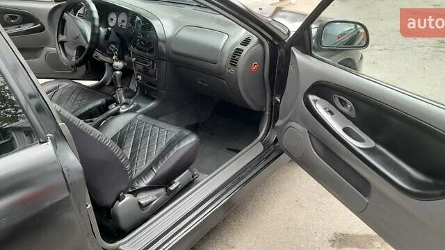 Чорний Міцубісі Кольт, об'ємом двигуна 1.3 л та пробігом 258 тис. км за 3650 $, фото 4 на Automoto.ua