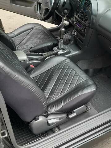 Чорний Міцубісі Кольт, об'ємом двигуна 1.3 л та пробігом 258 тис. км за 3650 $, фото 6 на Automoto.ua