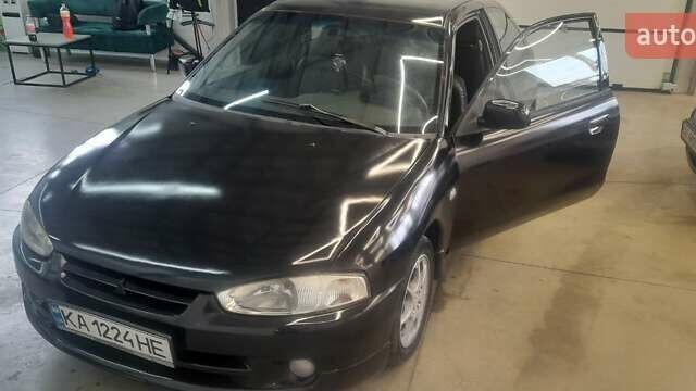 Чорний Міцубісі Кольт, об'ємом двигуна 1.3 л та пробігом 258 тис. км за 3650 $, фото 1 на Automoto.ua