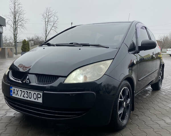 Черный Мицубиси Кольт, объемом двигателя 1.3 л и пробегом 114 тыс. км за 4000 $, фото 6 на Automoto.ua