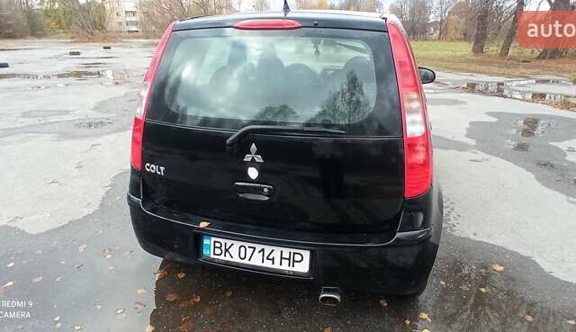 Міцубісі Кольт 2005 у Житомирі на Automoto.ua Чорний Міцубісі Кольт, об'ємом двигуна 1.33 л та пробігом 156 тис. км за 3598 $, фото 6 на Automoto.ua