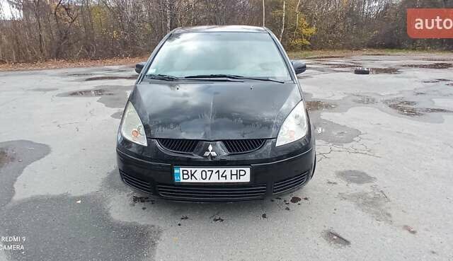 Міцубісі Кольт 2005 у Житомирі на Automoto.ua Чорний Міцубісі Кольт, об'ємом двигуна 1.33 л та пробігом 156 тис. км за 3598 $, фото 3 на Automoto.ua