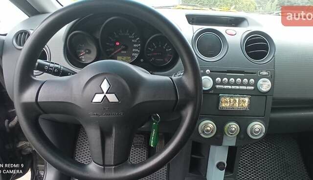 Міцубісі Кольт 2005 у Житомирі на Automoto.ua Чорний Міцубісі Кольт, об'ємом двигуна 1.33 л та пробігом 156 тис. км за 3598 $, фото 33 на Automoto.ua