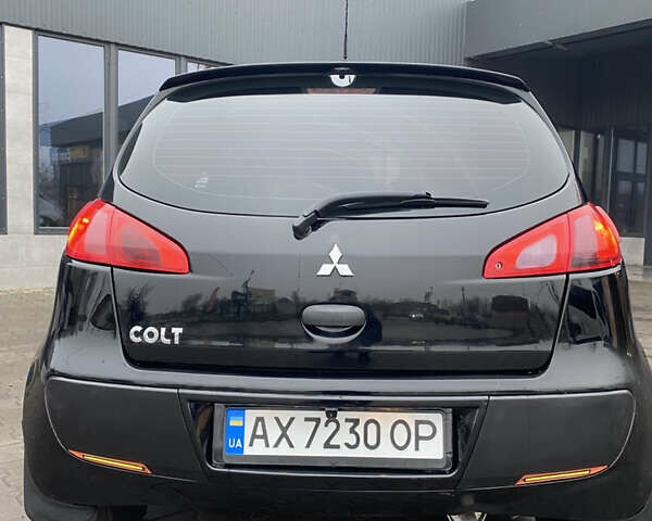 Черный Мицубиси Кольт, объемом двигателя 1.3 л и пробегом 114 тыс. км за 4000 $, фото 4 на Automoto.ua