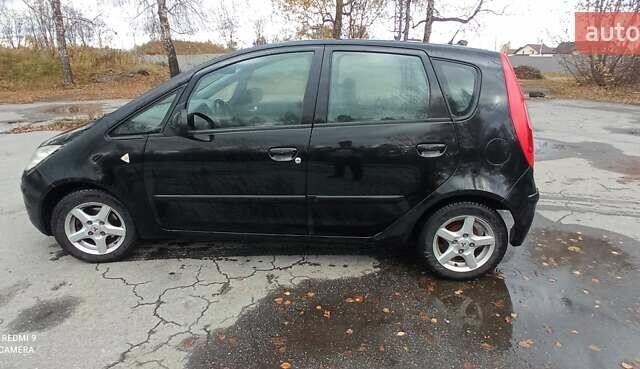 Міцубісі Кольт 2005 у Житомирі на Automoto.ua Чорний Міцубісі Кольт, об'ємом двигуна 1.33 л та пробігом 156 тис. км за 3598 $, фото 8 на Automoto.ua