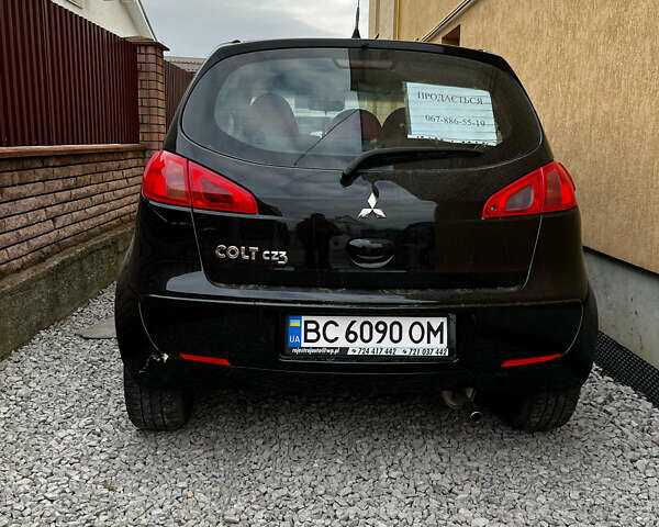 Міцубісі Кольт 2005 у Самборе на Automoto.ua Чорний Міцубісі Кольт, об'ємом двигуна 1.3 л та пробігом 188 тис. км за 3800 $, фото 6 на Automoto.ua