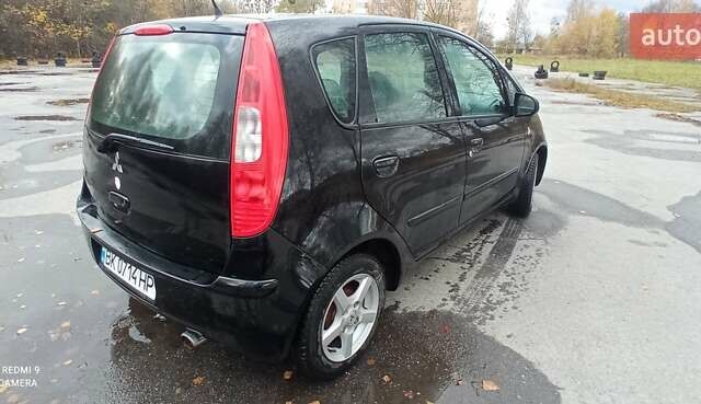 Міцубісі Кольт 2005 у Житомирі на Automoto.ua Чорний Міцубісі Кольт, об'ємом двигуна 1.33 л та пробігом 156 тис. км за 3598 $, фото 1 на Automoto.ua
