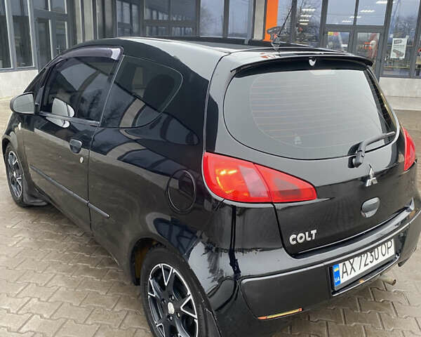 Черный Мицубиси Кольт, объемом двигателя 1.3 л и пробегом 114 тыс. км за 4000 $, фото 3 на Automoto.ua