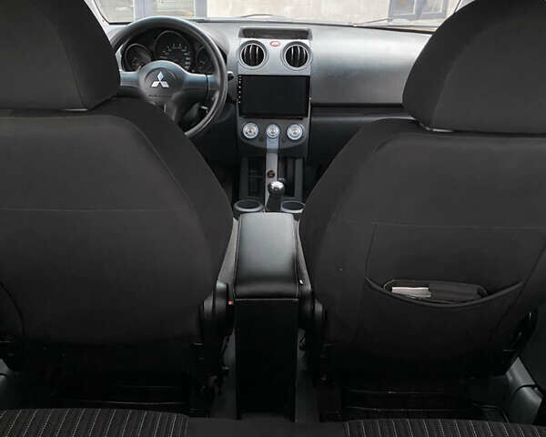 Черный Мицубиси Кольт, объемом двигателя 1.3 л и пробегом 114 тыс. км за 4000 $, фото 12 на Automoto.ua