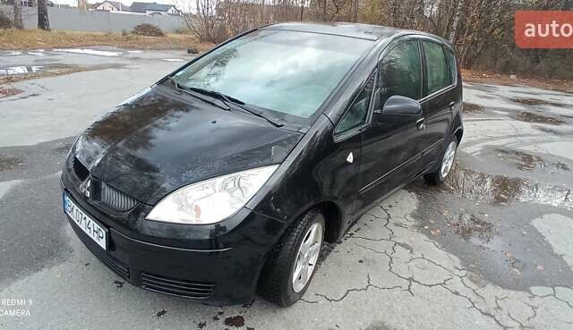 Міцубісі Кольт 2005 у Житомирі на Automoto.ua Чорний Міцубісі Кольт, об'ємом двигуна 1.33 л та пробігом 156 тис. км за 3598 $, фото 21 на Automoto.ua