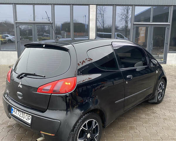 Черный Мицубиси Кольт, объемом двигателя 1.3 л и пробегом 114 тыс. км за 4000 $, фото 2 на Automoto.ua