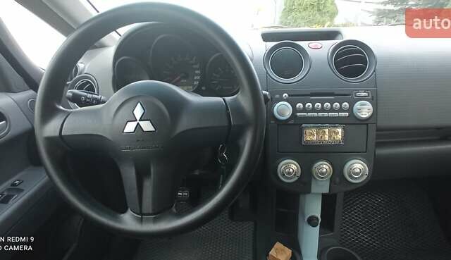 Міцубісі Кольт 2005 у Житомирі на Automoto.ua Чорний Міцубісі Кольт, об'ємом двигуна 1.33 л та пробігом 156 тис. км за 3598 $, фото 35 на Automoto.ua