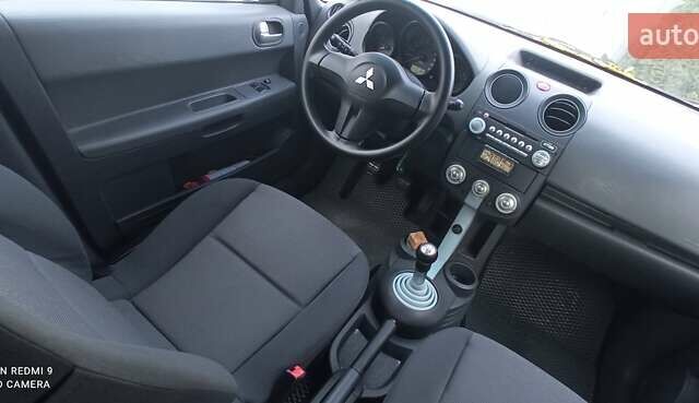 Міцубісі Кольт 2005 у Житомирі на Automoto.ua Чорний Міцубісі Кольт, об'ємом двигуна 1.33 л та пробігом 156 тис. км за 3598 $, фото 36 на Automoto.ua