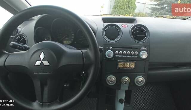 Міцубісі Кольт 2005 у Житомирі на Automoto.ua Чорний Міцубісі Кольт, об'ємом двигуна 1.33 л та пробігом 156 тис. км за 3598 $, фото 46 на Automoto.ua