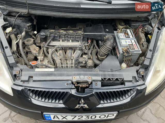 Черный Мицубиси Кольт, объемом двигателя 1.3 л и пробегом 114 тыс. км за 4000 $, фото 27 на Automoto.ua