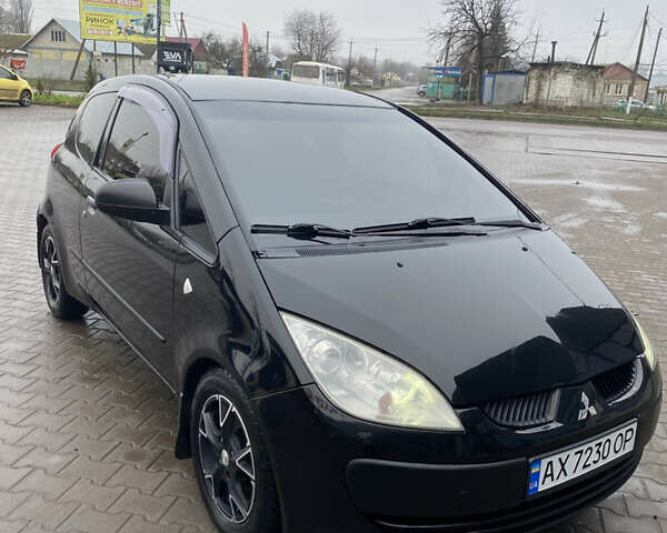 Черный Мицубиси Кольт, объемом двигателя 1.3 л и пробегом 114 тыс. км за 4000 $, фото 1 на Automoto.ua