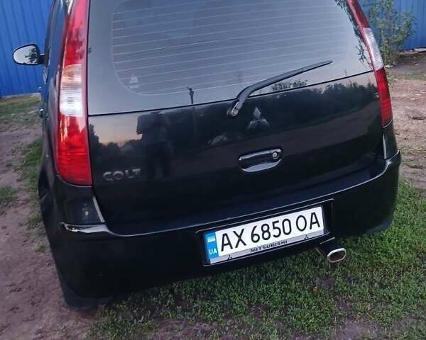 Чорний Міцубісі Кольт, об'ємом двигуна 1.3 л та пробігом 138 тис. км за 5500 $, фото 1 на Automoto.ua