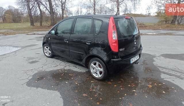 Міцубісі Кольт 2005 у Житомирі на Automoto.ua Чорний Міцубісі Кольт, об'ємом двигуна 1.33 л та пробігом 156 тис. км за 3598 $, фото 13 на Automoto.ua