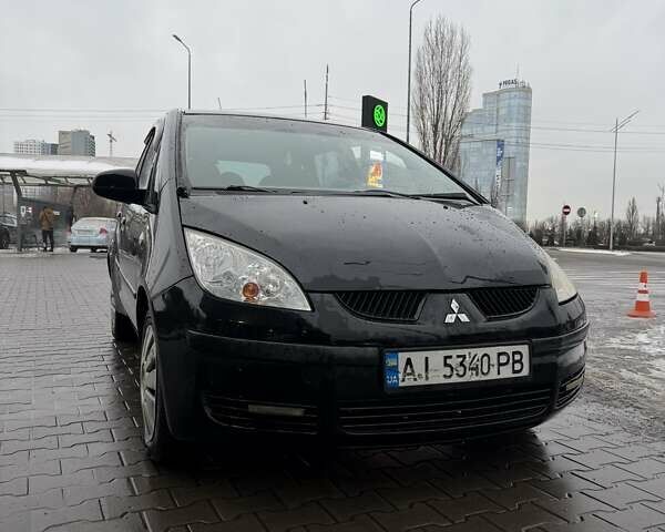 Черный Мицубиси Кольт, объемом двигателя 1.33 л и пробегом 266 тыс. км за 3300 $, фото 1 на Automoto.ua