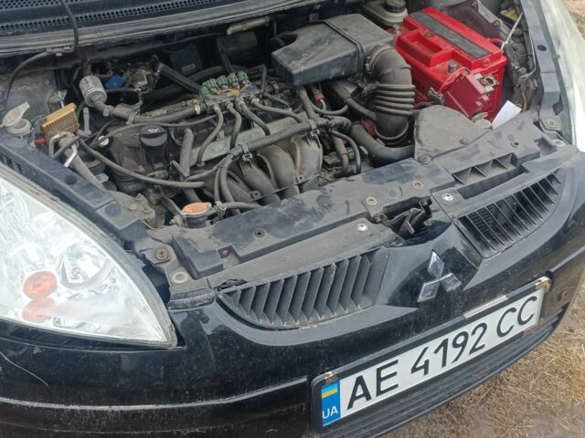 Чорний Міцубісі Кольт, об'ємом двигуна 1.3 л та пробігом 200 тис. км за 500 $, фото 7 на Automoto.ua