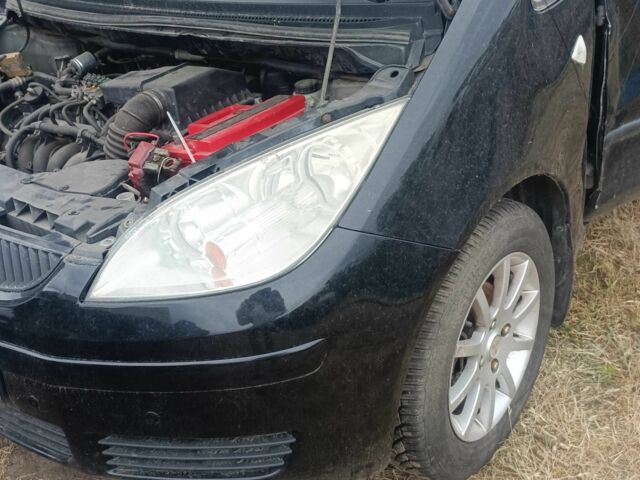 Чорний Міцубісі Кольт, об'ємом двигуна 1.3 л та пробігом 200 тис. км за 500 $, фото 9 на Automoto.ua