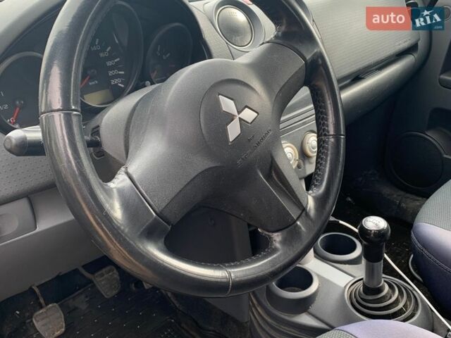 Черный Мицубиси Кольт, объемом двигателя 1.33 л и пробегом 152 тыс. км за 4500 $, фото 4 на Automoto.ua