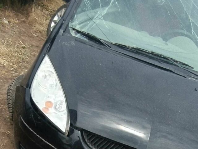 Чорний Міцубісі Кольт, об'ємом двигуна 1.3 л та пробігом 200 тис. км за 500 $, фото 6 на Automoto.ua