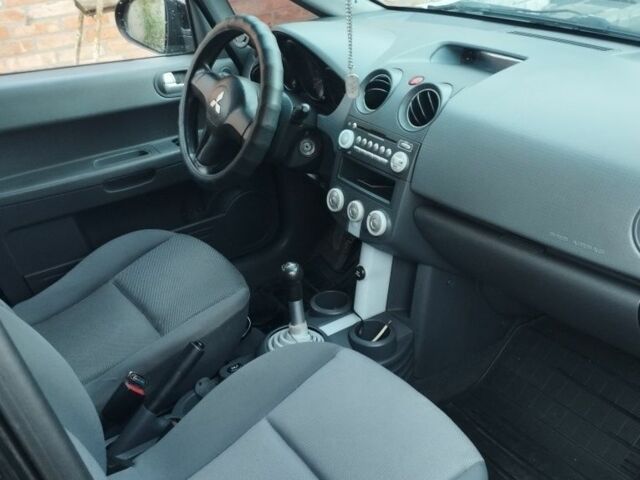 Черный Мицубиси Кольт, объемом двигателя 1.3 л и пробегом 215 тыс. км за 4300 $, фото 2 на Automoto.ua