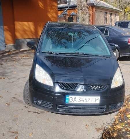 Чорний Міцубісі Кольт, об'ємом двигуна 1.3 л та пробігом 215 тис. км за 3800 $, фото 5 на Automoto.ua