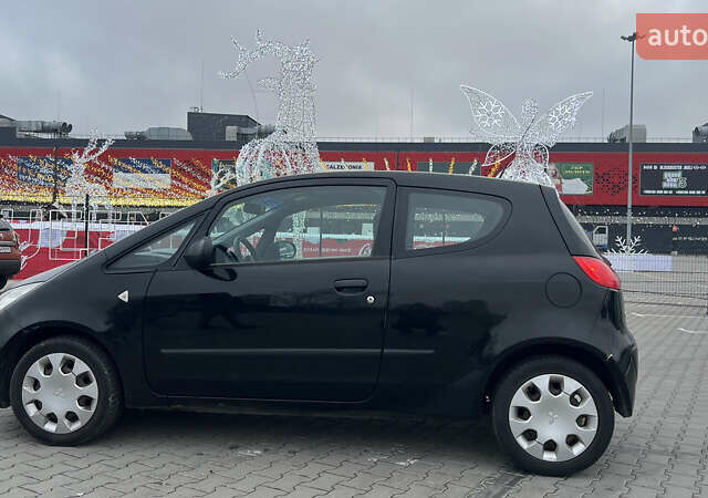 Чорний Міцубісі Кольт, об'ємом двигуна 1.3 л та пробігом 134 тис. км за 3600 $, фото 3 на Automoto.ua