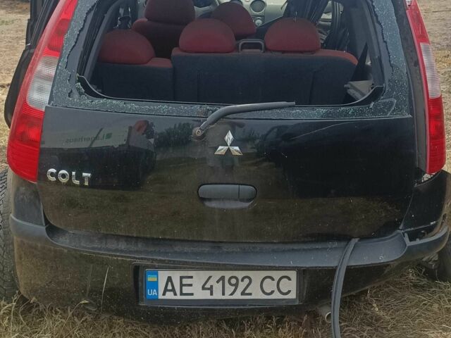 Чорний Міцубісі Кольт, об'ємом двигуна 1.3 л та пробігом 200 тис. км за 500 $, фото 1 на Automoto.ua