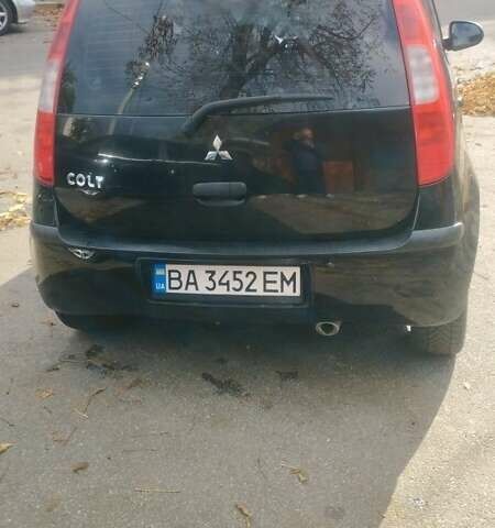 Чорний Міцубісі Кольт, об'ємом двигуна 1.3 л та пробігом 215 тис. км за 3800 $, фото 6 на Automoto.ua