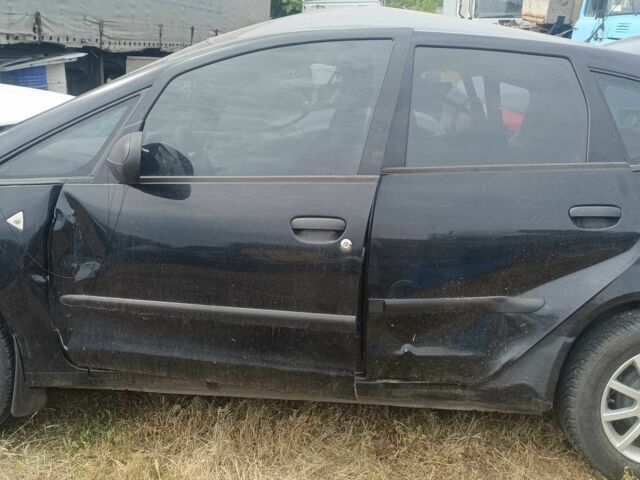 Чорний Міцубісі Кольт, об'ємом двигуна 1.3 л та пробігом 200 тис. км за 500 $, фото 2 на Automoto.ua