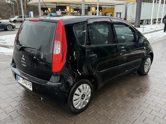 Чорний Міцубісі Кольт, об'ємом двигуна 1.3 л та пробігом 266 тис. км за 3150 $, фото 4 на Automoto.ua