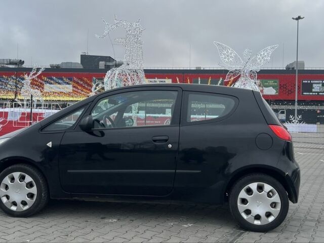 Черный Мицубиси Кольт, объемом двигателя 1.3 л и пробегом 134 тыс. км за 3600 $, фото 4 на Automoto.ua